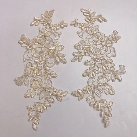 Spegelvänt par. Applikation på mesh. CHAMPAGNE/BEIGE