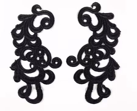 Applikation svart, spegelvänt par