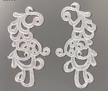 Applikation Vit, spegelvänt par