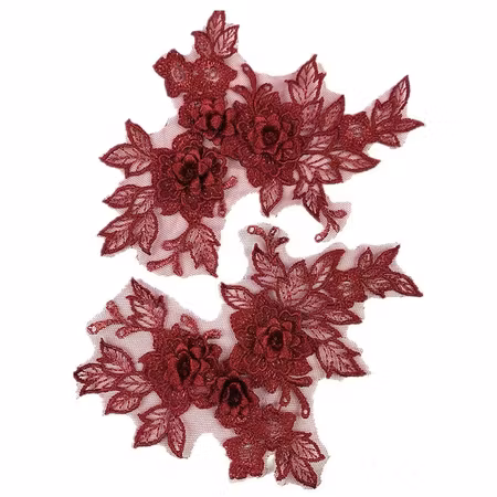 Spetsapplikation på mesh, spegelvänt par. Deep red