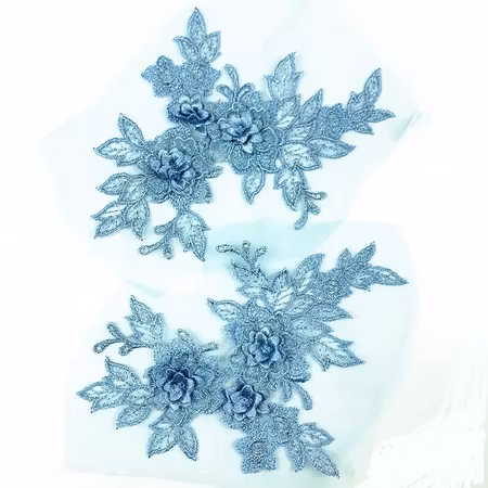 ÄSpetsapplikation på mesh, spegelvänt par. Blue