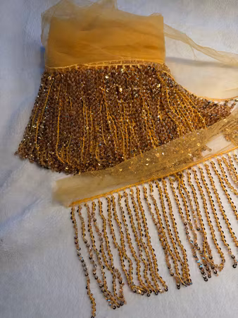 Fransband med pärlor och paljetter. Guld 0,5 meter