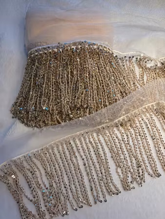 Fransband med pärlor och paljetter. Champagne 0,5 meter