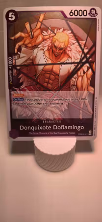 Donquixote Doflamingo | PRB02-011 | Purple Rare | The Seven Warlords of the Sea/Donquixote Pirates