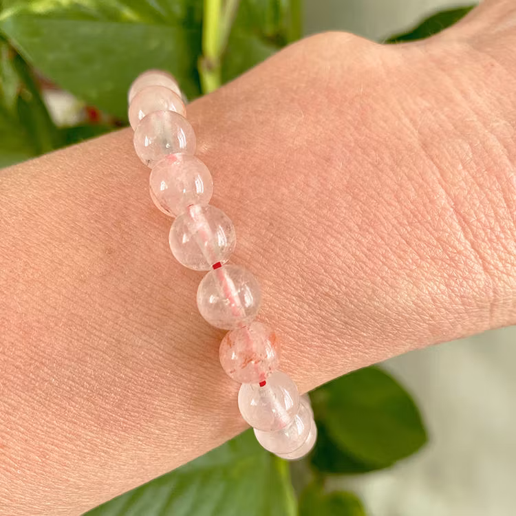 Eldkvarts "Hematoid" 8mm pärlor Armband