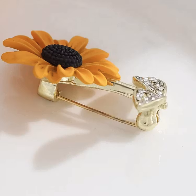 Solros Brosch
