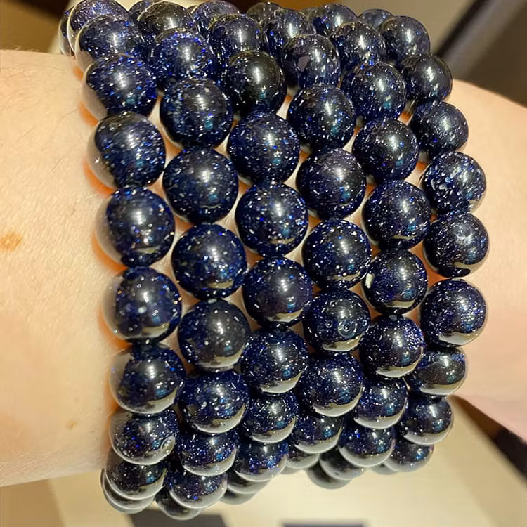 Sandsten "Goldstone" Blå 8mm Armband