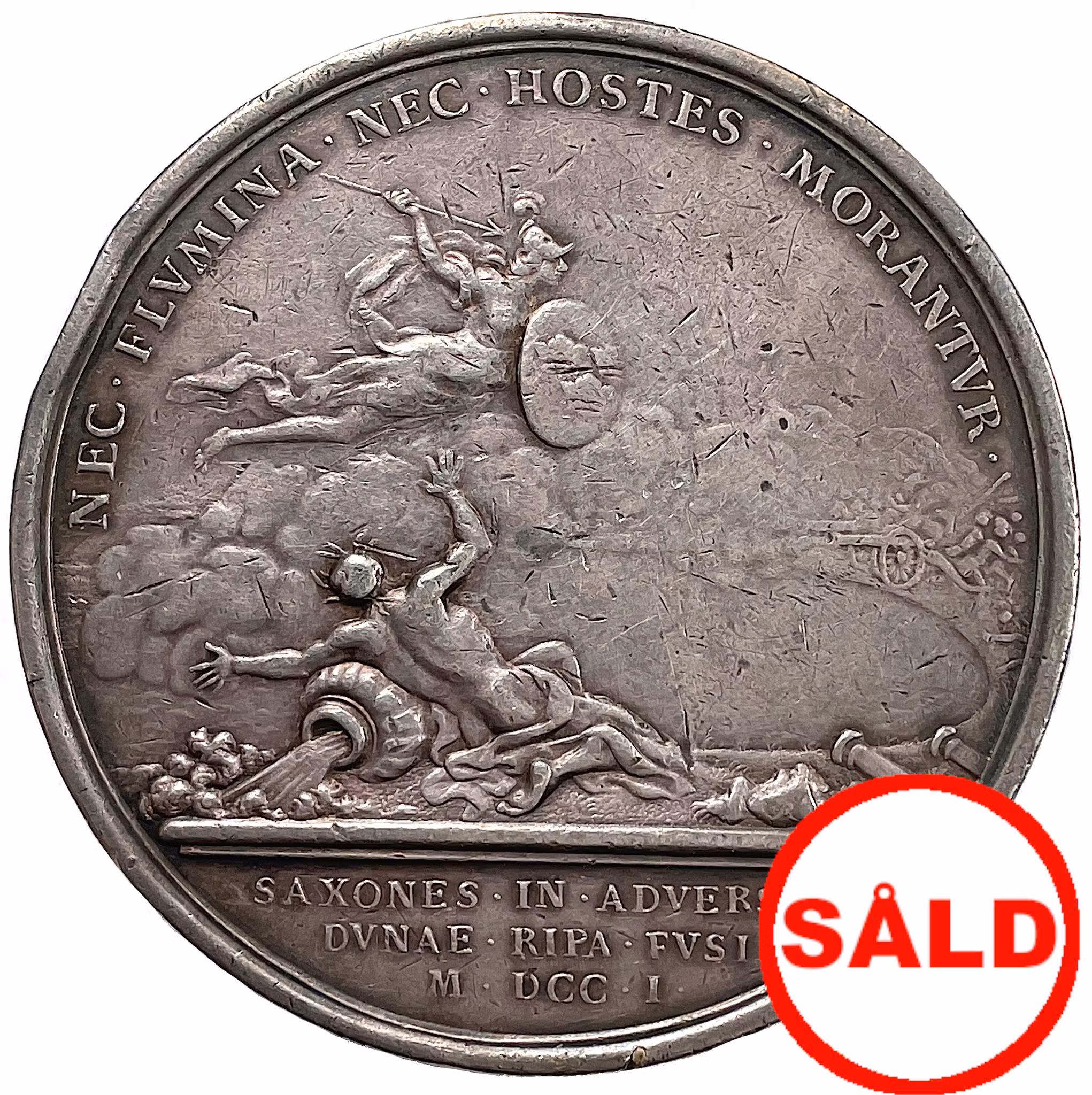 Karl XII går med sin här över Dünafloden och besegrar konung Augusts armé nära Riga den 9 juli 1701