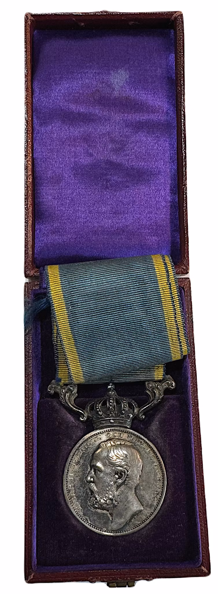 Oskar II - För medborgerlig förtjänst utdelad till smeden C. J. Lind av Lea Ahlborn