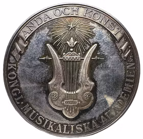 Oskar II - Kungliga musikaliska akademiens belöningsmedalj utdelad till Anna Rudberg den 31 maj 1983 graverad av Adolf Lindberg - Mycket sällsynt - I originaletui