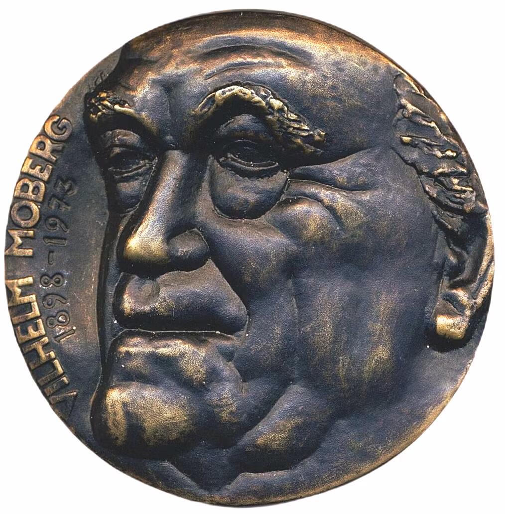 Vilhelm Moberg (1898–1973) - Pampig bronsmedalj med kontroversiellt motiv. Av Kauko Räsänen