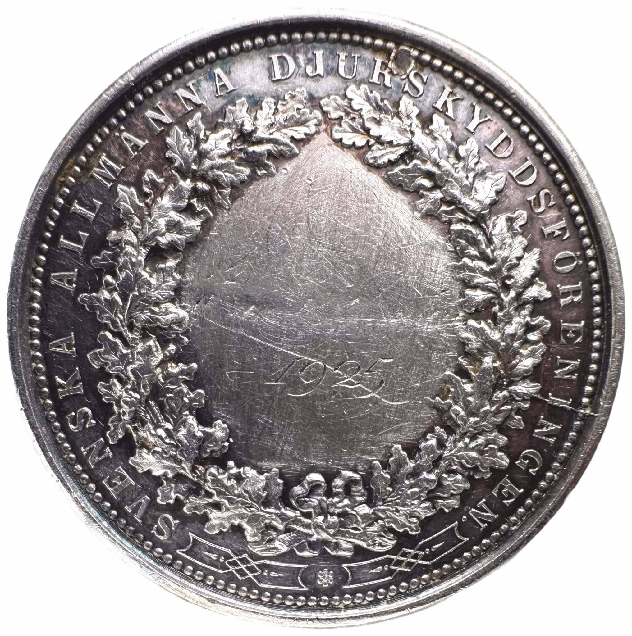 Oskar II - Svenska Allmänna Djurskyddsföreningens belöningsmedalj i silver