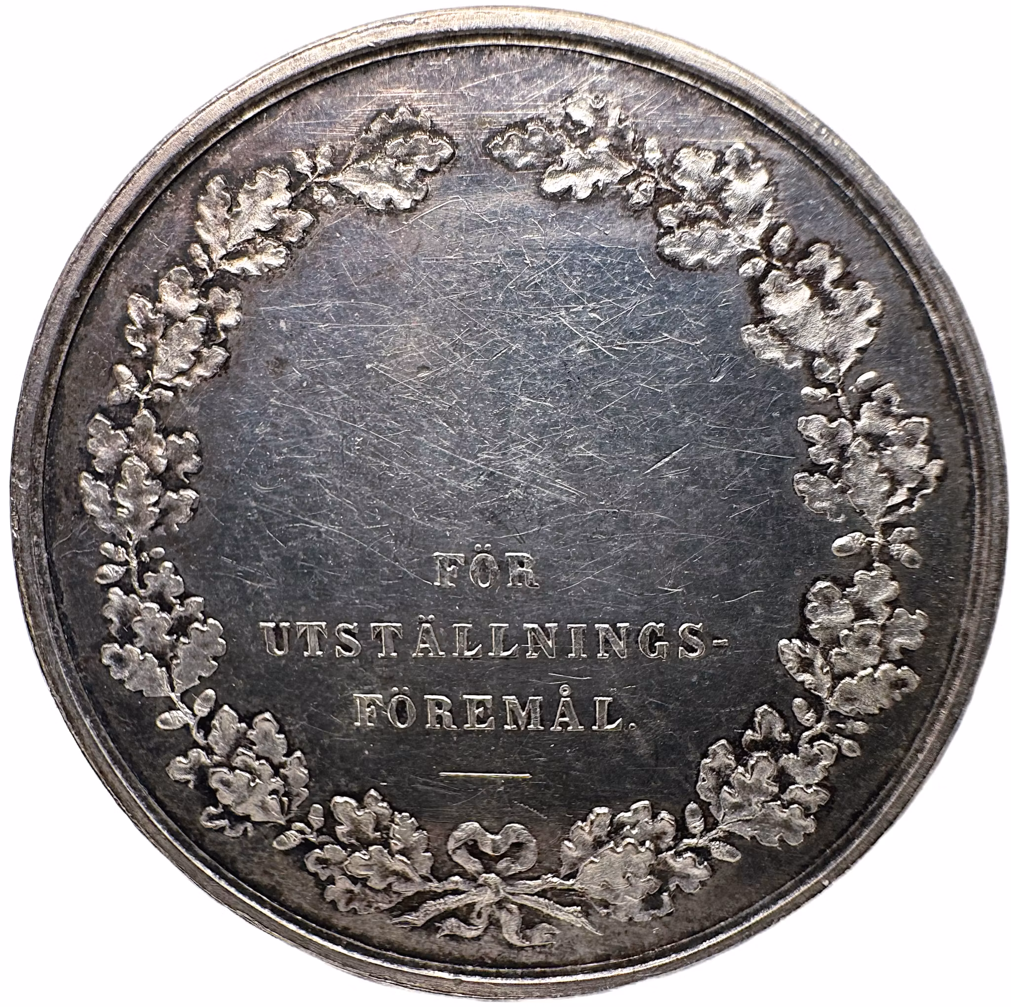 Oskar II - Silvermedalj från Skaraborgs läns Kungliga Hushållningssällskap – graverad av Lea Ahlborn 1877