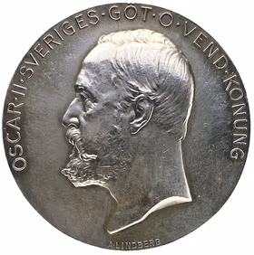 Oskar II - Belöningsmedalj i silver vid 20:e Allmänna svenska lantbruksmötet i Norrköping 1906 av Adolf Lindberg - Utdelad till Per Nilsson