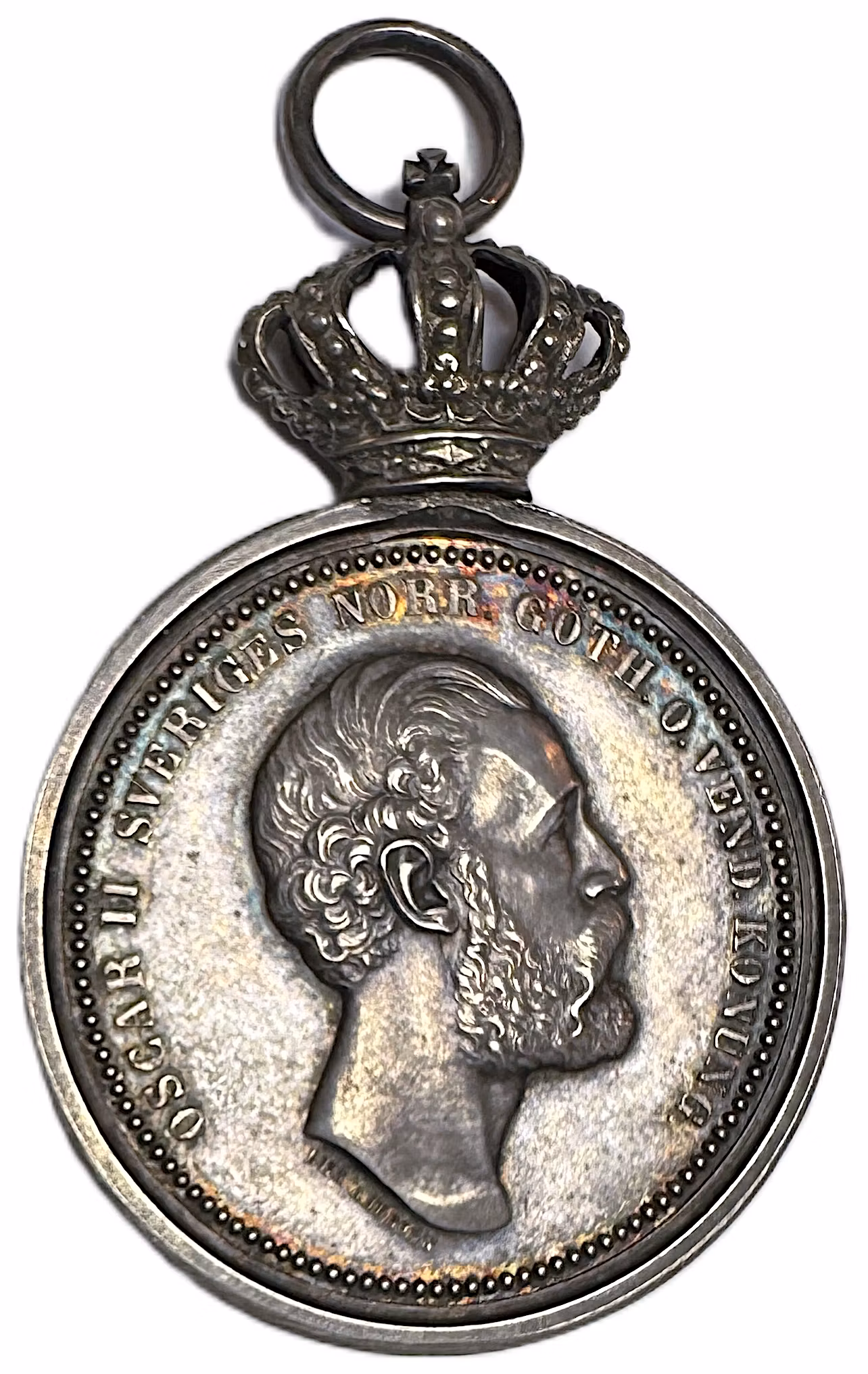 Oskar II - Kungliga Svenska Patriotiska sällskapets silvermedalj modell 1872 graverad av Lea Ahlborn