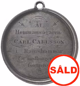 Oskar II – Kungliga Patriotiska Sällskapets belöningsmedalj tilldelad Carl Carlsson i Ramshammar för medborgerlig förtjenst.