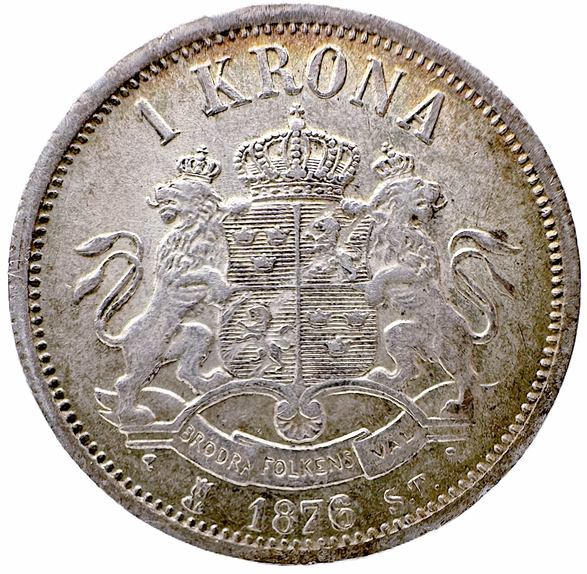 Oskar II (1872-1907). 1 Krona 1876. Sista årtalssiffran omgraverad från en 5:a (1876/5) - Underbar originalpatina och fin guldskimrande bottenlyster