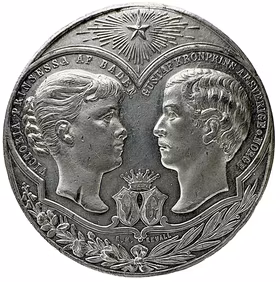 Kronprinsparet Gustav och Victoria av Badens giftermål 1881 av E. H. Ekvall - En härligt lystrig tennmedalj med frostaktig relief - En dynastisk fullträff