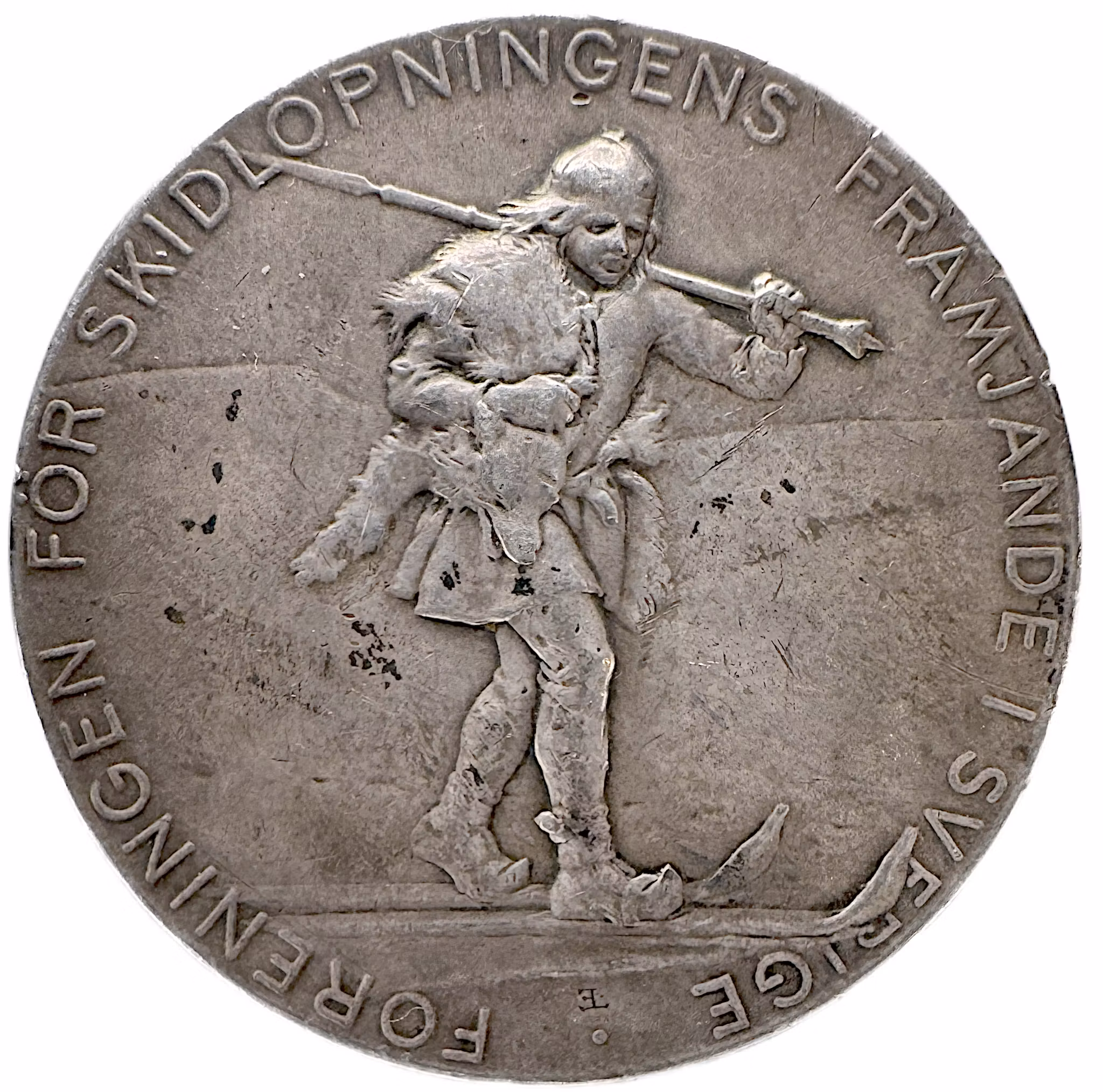 Oskar II - Föreningen för skidlöpningens främjande i Sverige (1899): Pris- och förtjänstmedalj för skidsport - av Erik Lindberg efter en tecknad förlaga av konstnären Johan Tirén