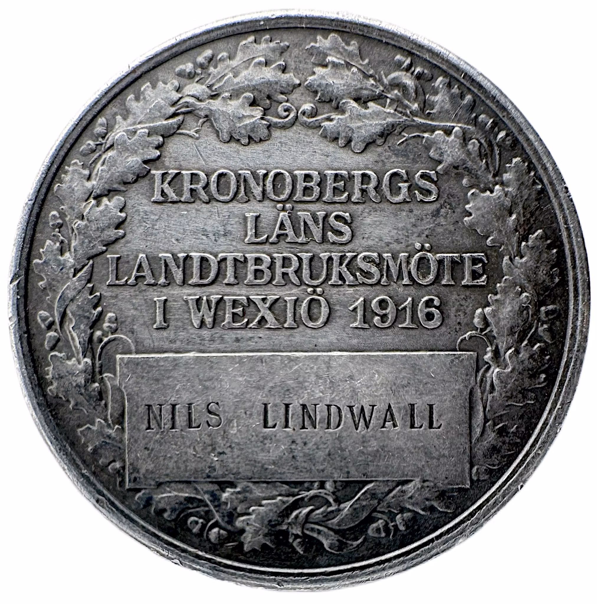 Kronobergs läns Hushållningssällskap (1916): Kronobergs läns landtbruksmöte i Wexiö 1916 (100-årsjubileum) - Tilldelad Nils Lindwall - Från tobakspipor till jubileumsmöten
