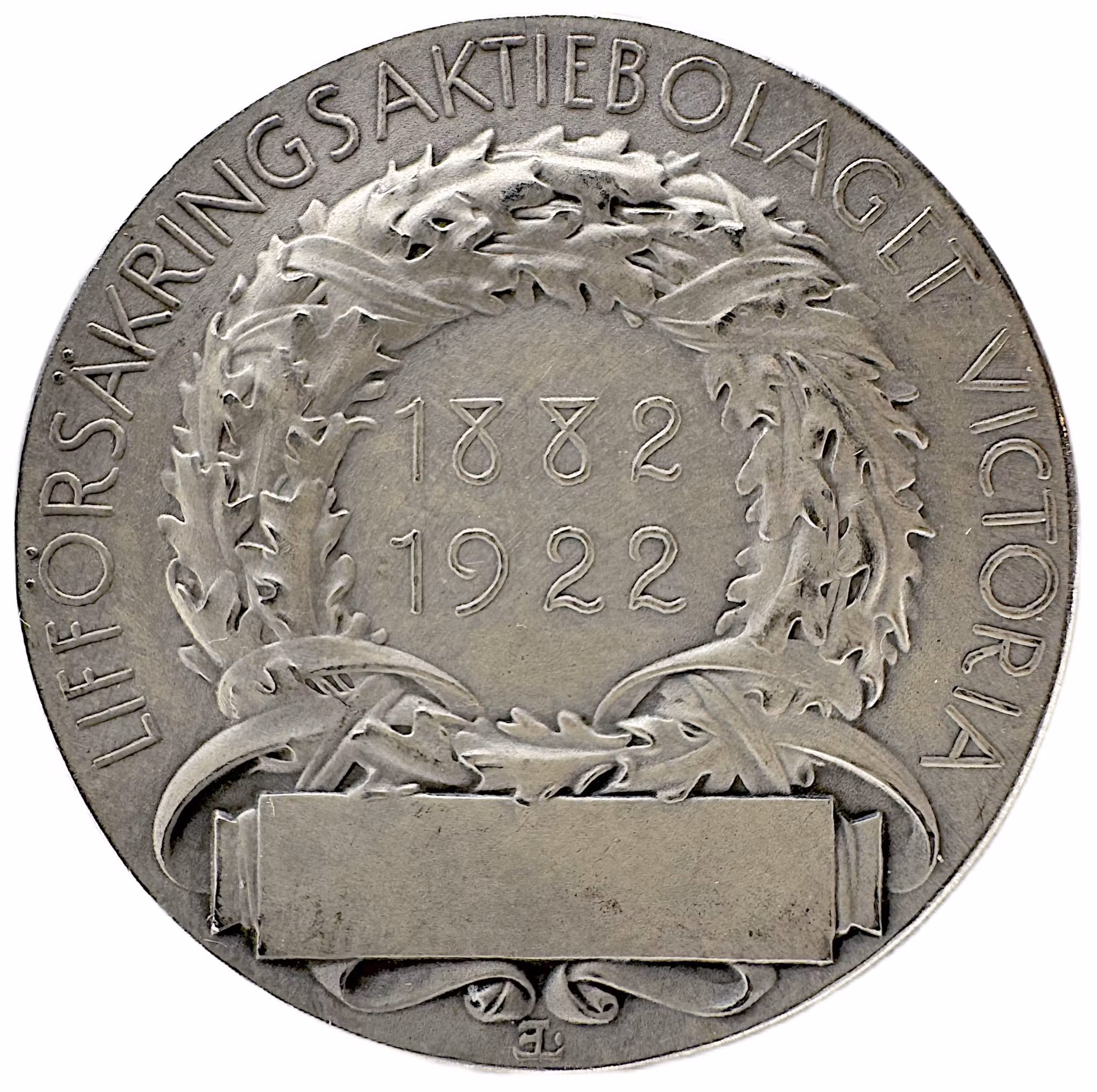 Lifförsäkringsaktiebolaget Victorias belöningsmedalj 1922 av Erik Lindberg - Ett växande behov av trygghet i ett nytt Sverige