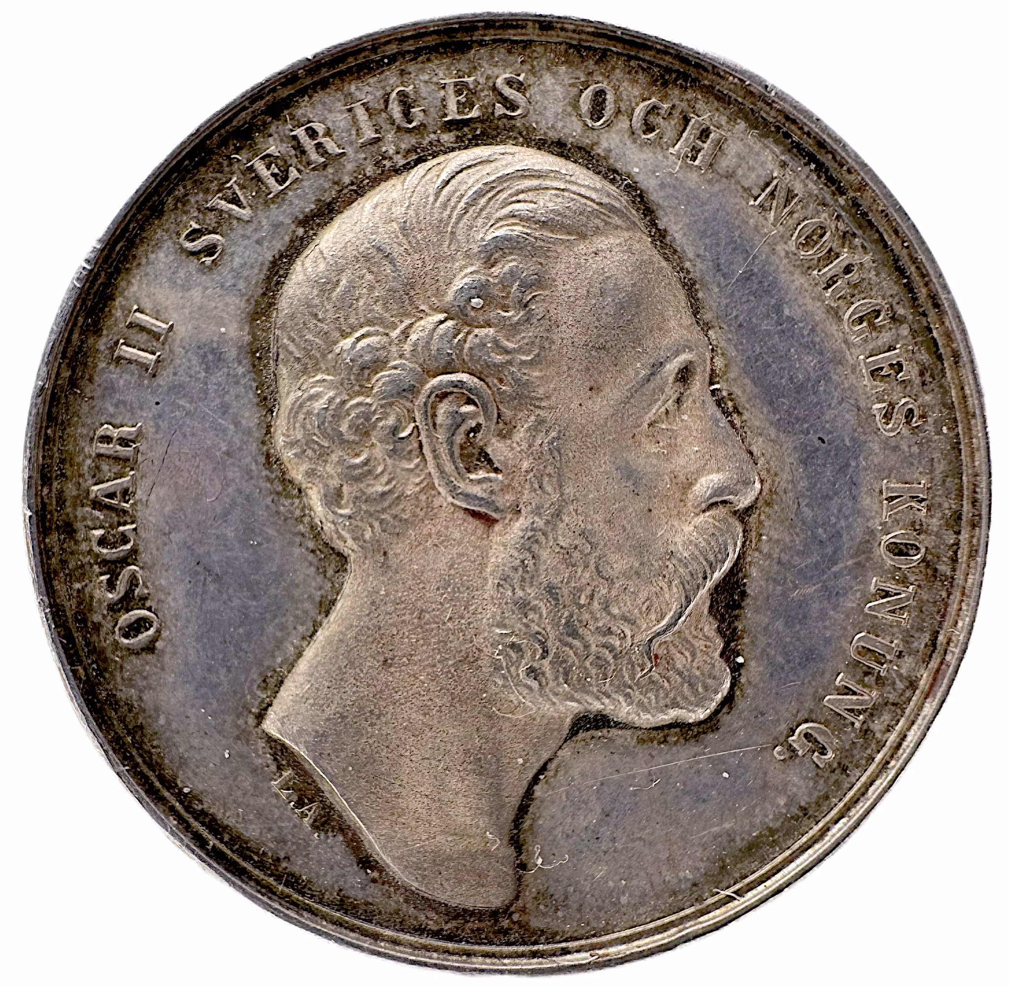 Oskar II: Norrbottens läns kungliga hushållningssällskaps belöningsmedalj (modell 1877) av Lea Ahlborn