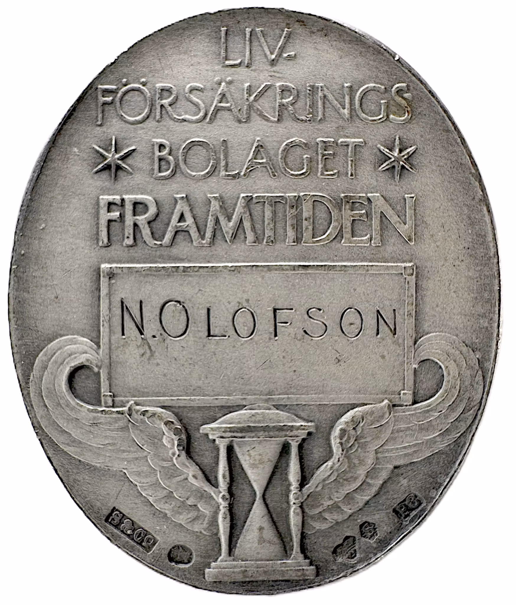 Livförsäkringsbolaget Framtidens jubileums- och förtjänstmedalj av Erik Lindberg 1936 - Tilldelad N. Olofson år 1941