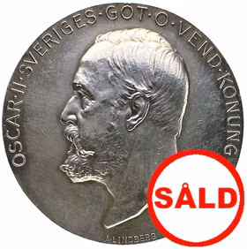 Oskar II - Belöningsmedalj i silver vid 20:e Allmänna svenska lantbruksmötet i Norrköping 1906 av Adolf Lindberg - Utdelad till Per Nilsson