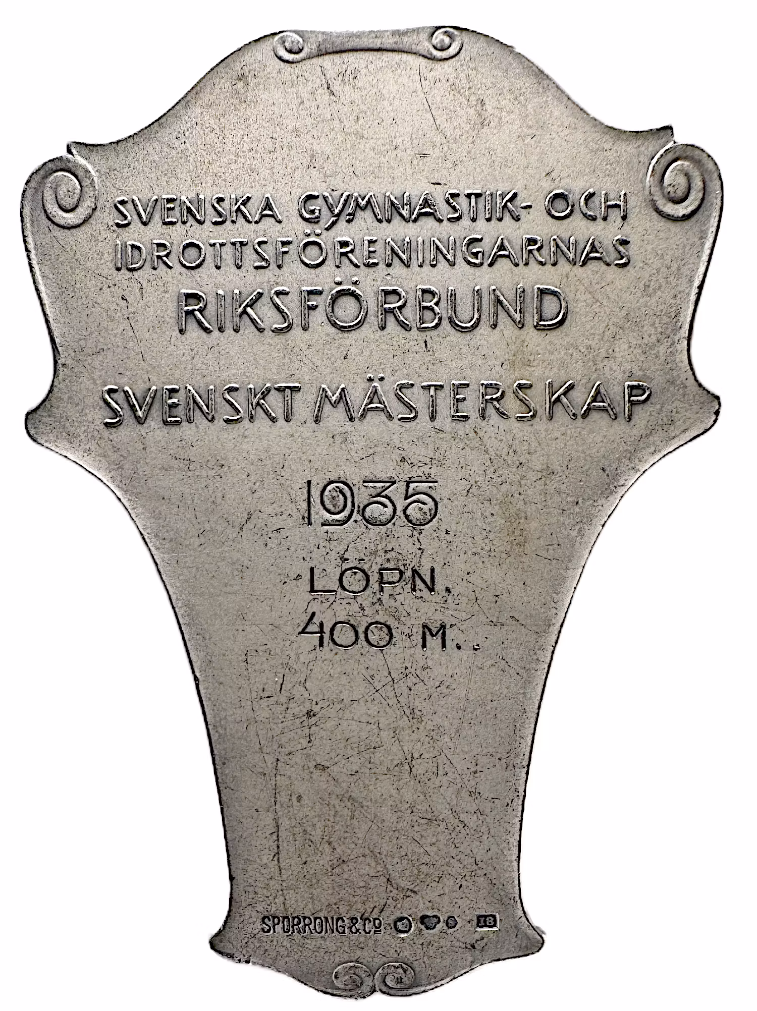 Svenska Gymnastik- och Idrottsföreningarnas Riksförbund (SM-plakett 1935) av Erik Lindberg (1909)