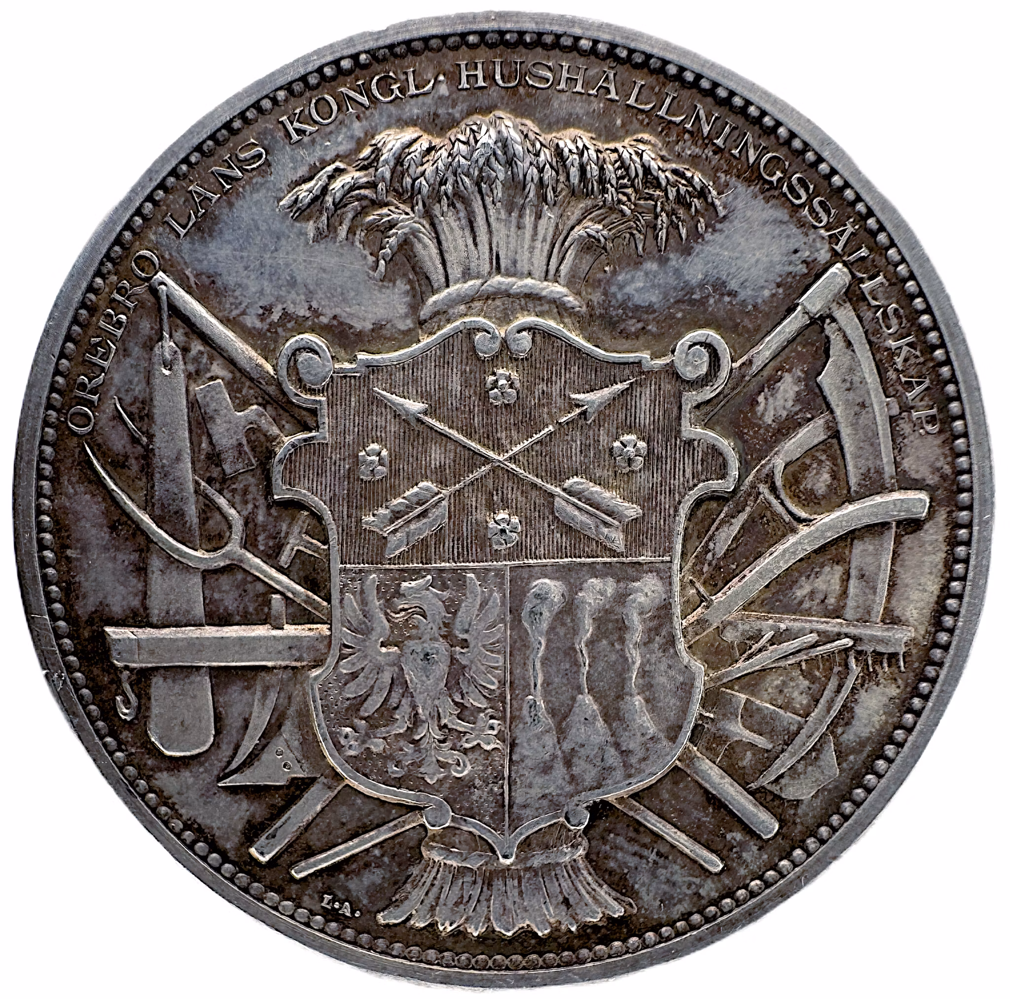 Oskar II: Örebro läns kungliga hushållningssällskap (modell 1888) - Ett underbart klassiskt motiv, inspirerat av antika ideal med förebild från den grekiska stadsstaten Sybaris i södra Italien