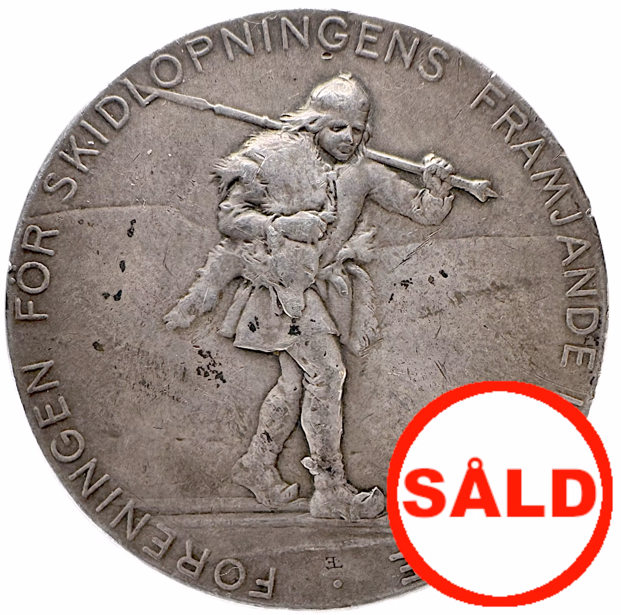 Oskar II - Föreningen för skidlöpningens främjande i Sverige (1899): Pris- och förtjänstmedalj för skidsport - av Erik Lindberg efter en tecknad förlaga av konstnären Johan Tirén