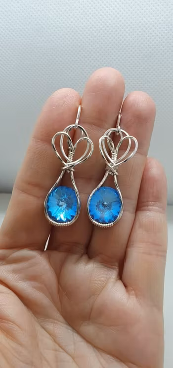 Örhängen Sweet Swirls med Ocean DeLite Swarovski kristaller
