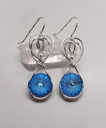 Örhängen Sweet Swirls med Ocean DeLite Swarovski kristaller