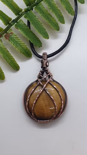 Halsband Criss Cross i koppar med tigeröga
