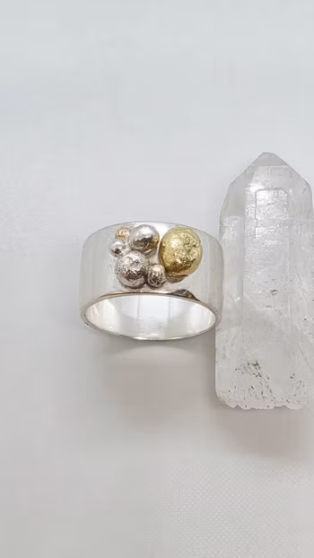 Ring med 925 sterlingsilver- och guldkulor