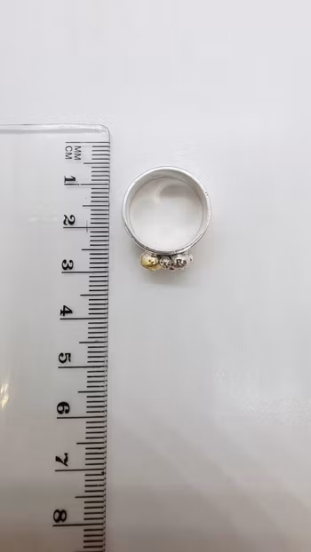 Ring med 925 sterlingsilver- och guldkulor