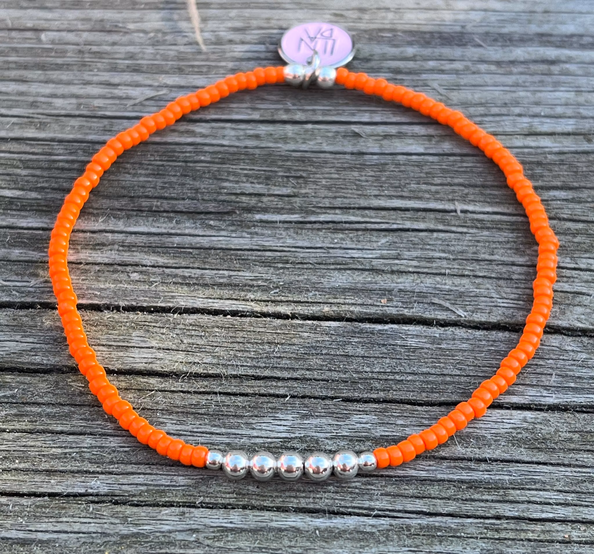 Orange med silver