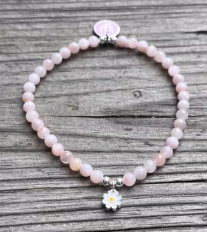 Ljusrosa snäckskalspärlor med blomberlock