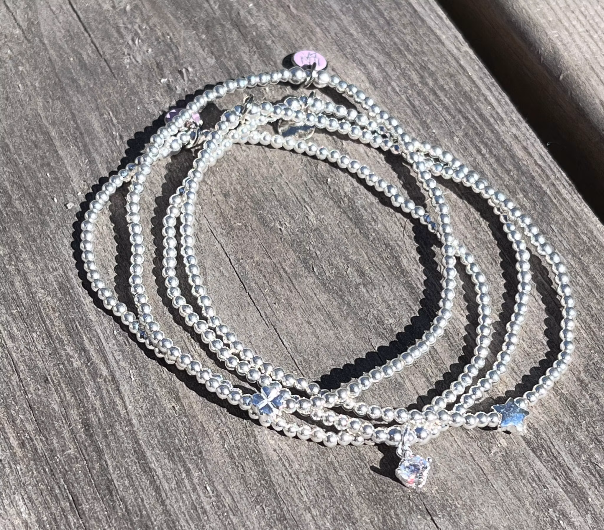 2 mm med gnistrande berlock