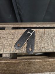 Läderfästen till säkerhetsstigbyglar