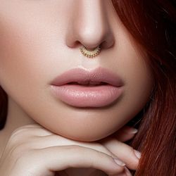 Piercingring med boll mönster