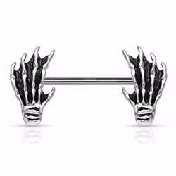 Bröstpiercing med skeletthänder