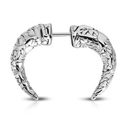 Septum horn piercing