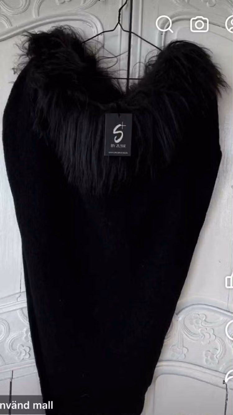 Ullponcho med fårskinn