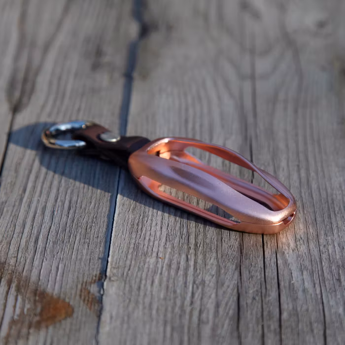 Läcker rosafärgade nyckelhållare i aluminium till Tesla Model X