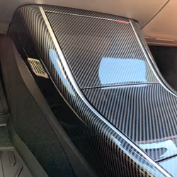 Sidopaneler t mittkonsollen, glossy carbon fiber - Tesla Model 3