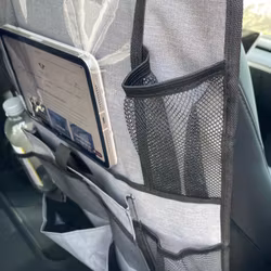 Förvaringsficka t baksidan av framsätena, grå