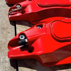 Kåpor till bromsoken, röda - Tesla Model Y