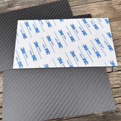 Paneler t mittkonsolen, äkta matt carbon fiber - Tesla Model 3 2023.10-/Y 2025.3-