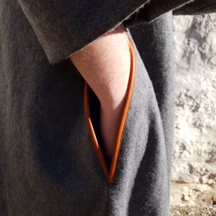 Kåpa med skinnskoning